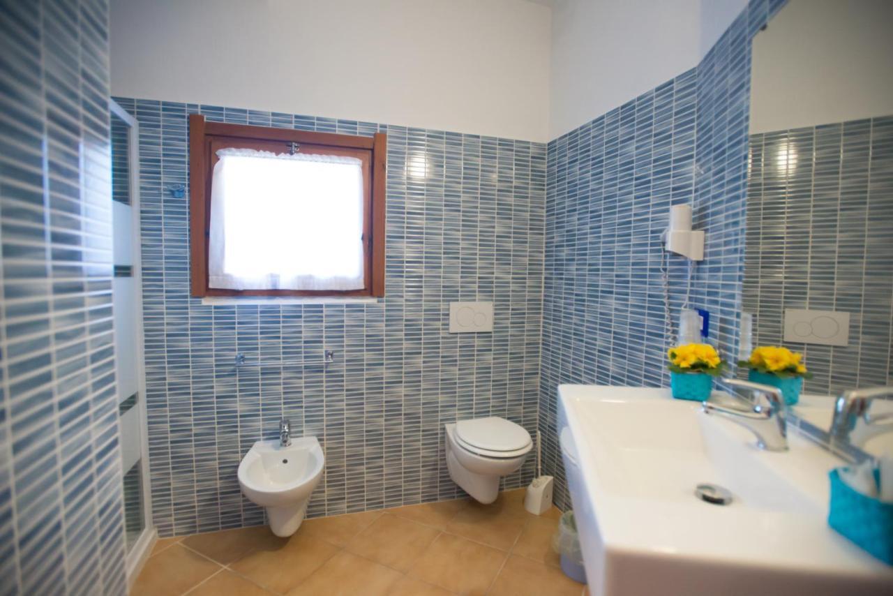 Aparthotel Baia Delle Mimose Badesi Exterior foto